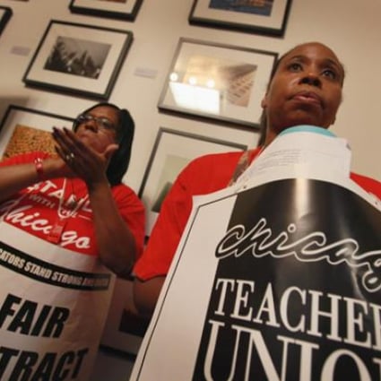 Striking Chicago public school teachers attend a press conference by The Chicago Teachers Solidarity Campaign outside the office of Mayor Rahm Emanuel in City Hall, Chicago, Illinois on Monday. Photo: AFP
