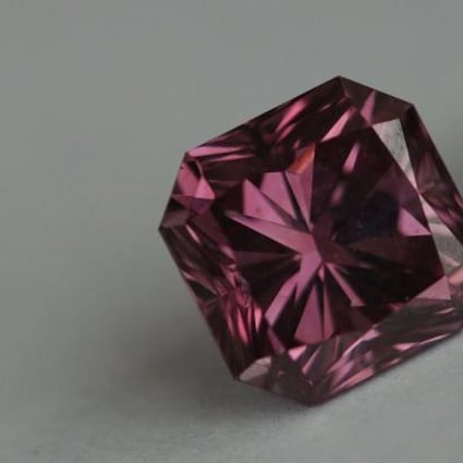 A Rio Tinto 1.32 carat square radiant pink diamond known as the Argyle Siren, which could easily fetch over US$1 million, is displayed in Hong Kong. Photo: AFP