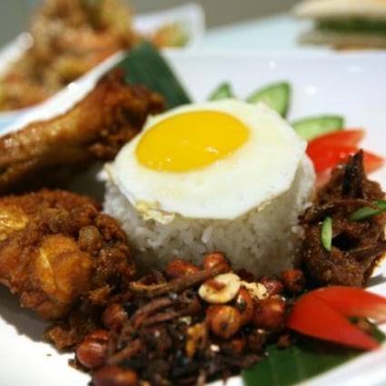 The most popular meal to start the day is nasi lemak, Malaysia's national dish.
