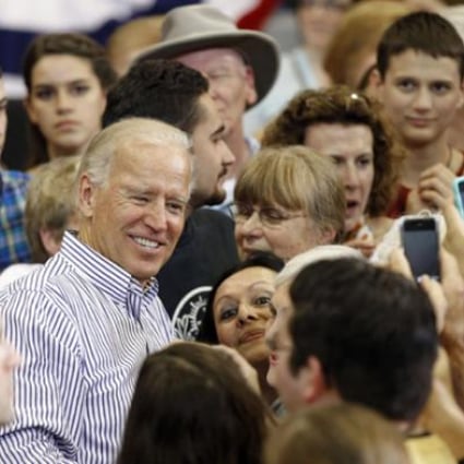 Vice President Joe Biden poses for photos with supporters during a campaign event in Asheville, North Carolina, on Tuesday. Photo: AP