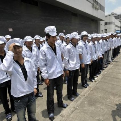 Workers at a Foxconn factory in Shenzhen. Photo: AFP