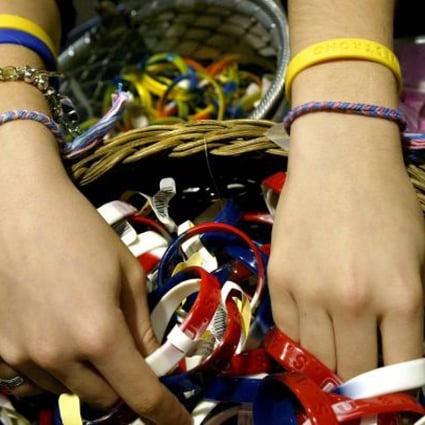 More than 80 million bracelets have been sold to support Lance Armstrong's charity to battle cancer. Photo: AFP