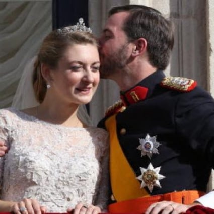 Stephanie, Hereditary Grand Duchess of Luxembourg (left) and Prince Guillaume, Hereditary Grand Duke of Luxembourg (right) after their wedding on Saturday. Photo: EPA