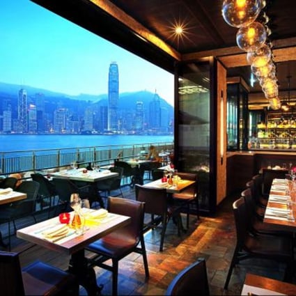 AL MOLO RESTAURANT HAS A BUSY ATMOSPHERE AND GREAT VIEWS OF HONG KONG ISLAND, WHEN THE QUAY IS EMPTY