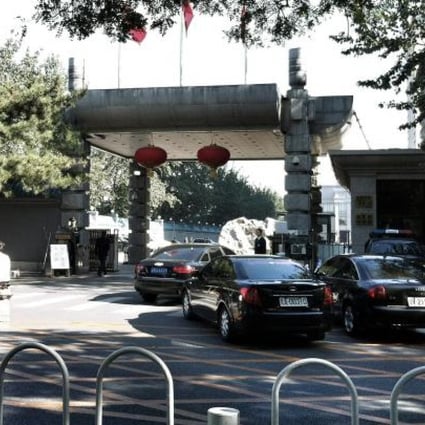 Black Audis, the vehicle of choice for senior party officials, drive up to the entrance of the Jingxi Hotel, in western Beijing. Photo: SCMP