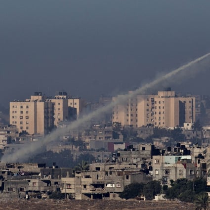 A picture taken from the southern Israeli town of Sderot shows a rocket being launched from the Gaza Strip into Israel on Thursday. Photo: AFP
