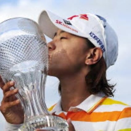 Na Yeon Choi, of South Korea, kisses her trophy after winning the LPGA Titleholders golf tournament, on Sunday, in Naples, Florida. Photo: AP