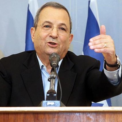 Israeli Defence Minister Ehud Barak announces his resignation at his offices in Tel Aviv on Monday. Photo: EPA 