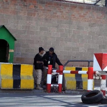 Yemeni soldiers stand guard outside the Saudi embassy in Sanaa, Yemen, on Wednesday. Photo: EPA