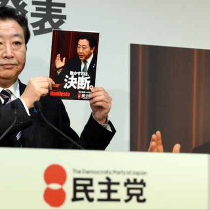 Japanese Prime Minister Yoshihiko Noda, who is also leader of the ruling Democratic Party of Japan (DPJ), announces DPJ campaign pledges at the party's headquarters. Photo: AFP