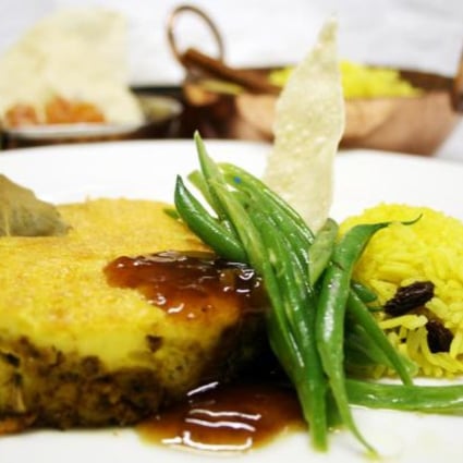 Bobotie, a curried beef dish topped with egg custard, is likely to have originated in Jakarta. Photo: Mount Nelson hotel