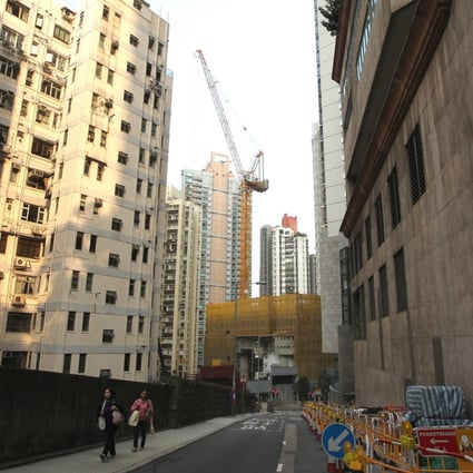 Narrow roads thread their way between Mid-Levels apartment blocks, with Leung Chun-ying set on building more homes. Photo: Dickson Lee