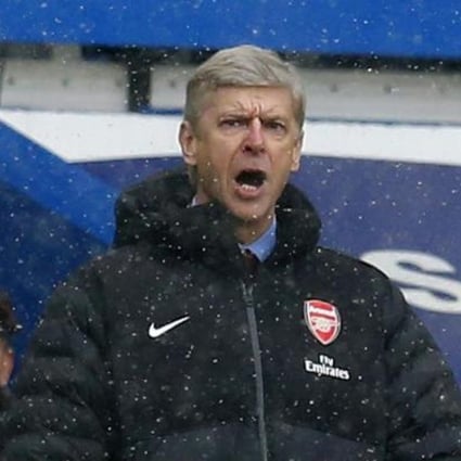 An angry Arsene Wenger in the dugout at Chelsea. Photo: Reuters