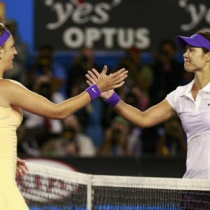 Victoria Azarenka of Belarus (left) with Li Na of China after defeating her in their singles final at the Australian Open tennis tournament on Saturday. Photo: Reuters