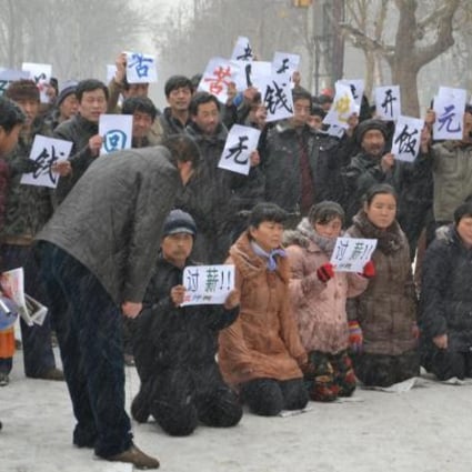 Workers protest over unpaid wages in Hebei. Photo: ImagineChina