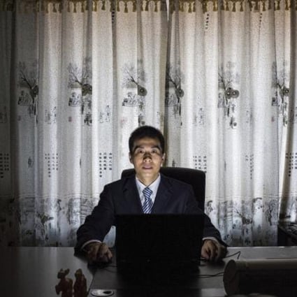 Zhu Ruifeng, a citizen journalist known for recently exposing sex scandals and corruptions. Photo: NYT