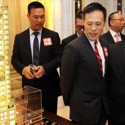 Victor Tin (2nd from left), associate director of Sino Land says the firm will offer an initial batch of 30 flats at The Avery in the first stage. Photo: Dickson Lee
