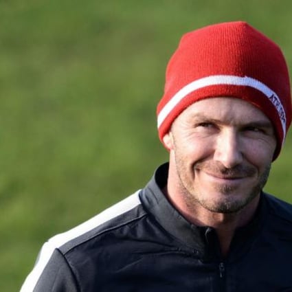 Fans doubt David Beckham can help clean up the tainted Chinese Super League. Photo: AFP