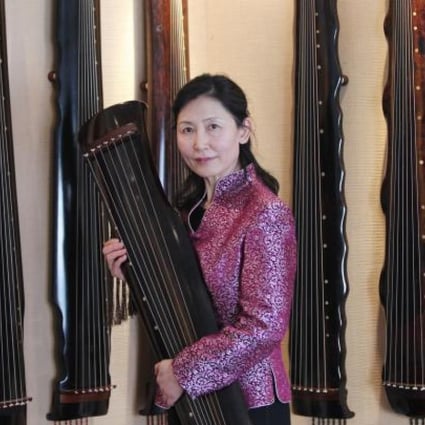 Huang Wenyi's love for the seven-stringed guqin began in earnest about 14 years ago in Beijing and she has since compiled a lesson book with 20 pieces of the instrument's works for her students. Photo: Simon Song