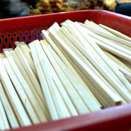 Disposable wooden chopsticks are seen at a restaurant. Photo: Xinhua
