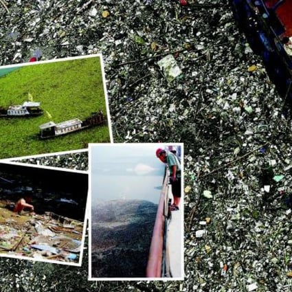 A man navigates through a flooded street filled with garbage (inset, bottom left), part of the flotsam piling up in the Yangtze. Photos: Reuters