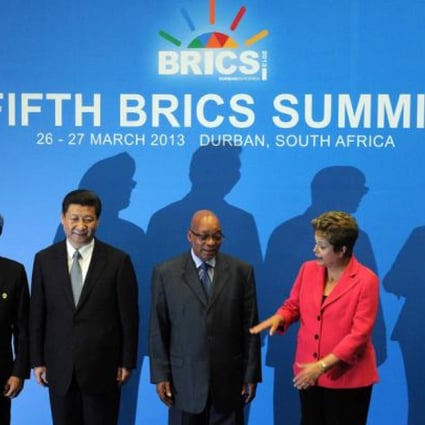BRICS leaders (from left): India Prime minister Manmohan Singh, President of the People's Republic of China Xi Jinping, South Africa's President Jacob Zuma, Brazil's President Dilma Rousseff and Russian Federation President Vladimir Putin. Leaders from the BRICS group of emerging powers failed to launch a much-anticipated new development bank to rival Western-dominated institutions like the World Bank. Photo: AFP