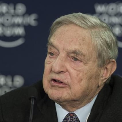 Billionaire investor George Soros speaks at the World Economic Forum in Davos. Photo: EPA