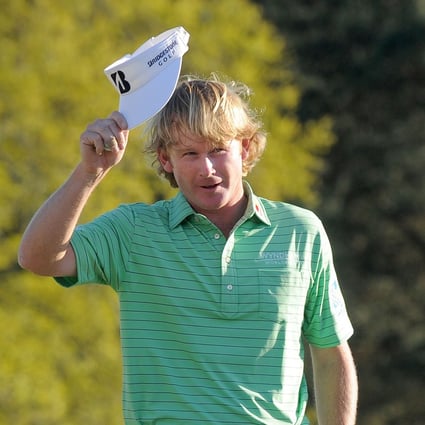 Brandt Snedeker of the US waves to the crowd on the 18th green during the third round of the 77th Masters golf tournament on Saturday at Augusta National Golf Club. Photo: AFP 