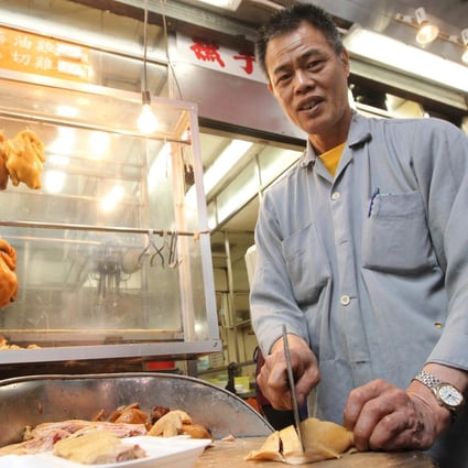 Chan Cheuk-ming, the owner of Pei Ho Barbeque Restaurant, is happy to help the needy in Sham Shui Po. Photo: Edward Wong