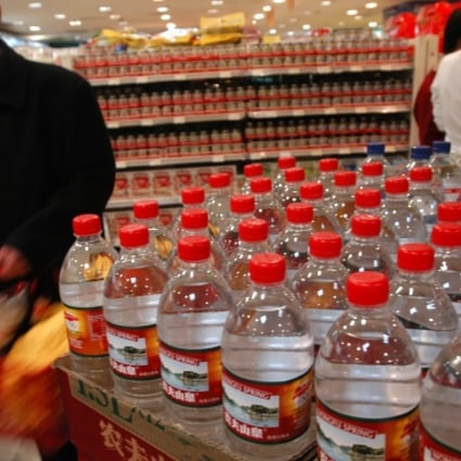 Nongfu Spring water is sold in Beijing. The brand saw its sales of bottled water drop after a newspaper investigated its quality standards. Photo: Ricky Wong