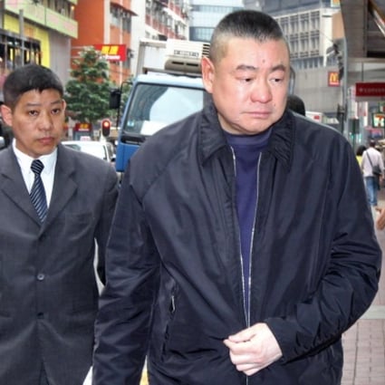 Joseph Lau (right), whose medical report was run in a Chinese newspaper last week, outside a city restaurant yesterday.Photo: David Wong