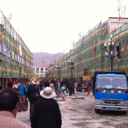 Construction is seen in the old town section of Lhasa. Photo via Woeser