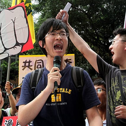 Protesters shout anti-Philippine slogans in front of the Philippine trade office in Tapei on Tuesday. Photo: EPA