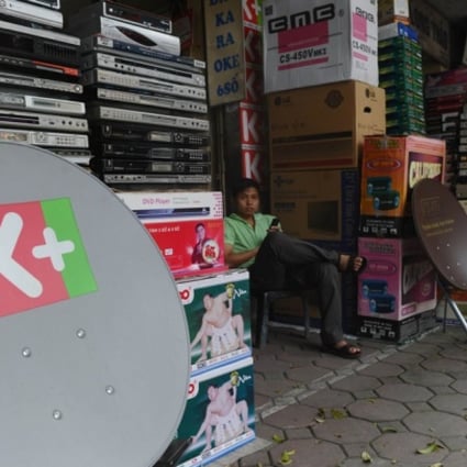 The local Vietnamese satellite television broacaster K + has stopped airing foreign channels including CNN, BBC and Star World to comply with a new media law. Photo: AFP