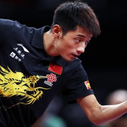Zhang Jike on his way to beating Wang Hao in Paris. Photo: Reuters
