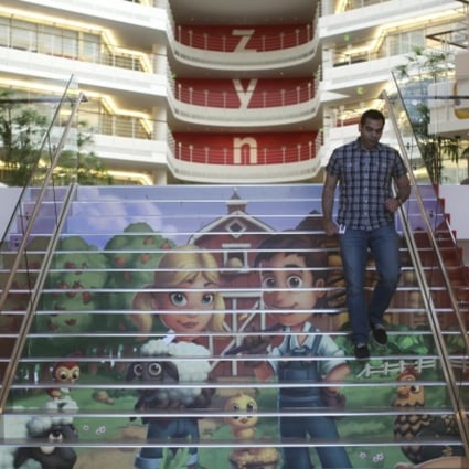 Player avatars from Zynga's FarmVille 2 are seen on a stairway at the entrance to Zynga headquarters in San Francisco. Photo: Reuters