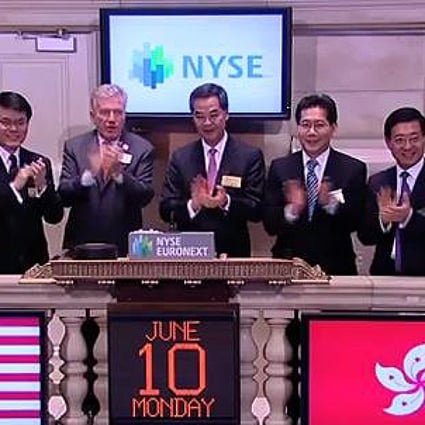 Hong Kong Chief Executive Leung Chun-ying rings the closing bell at the New York Stock Exchange. 