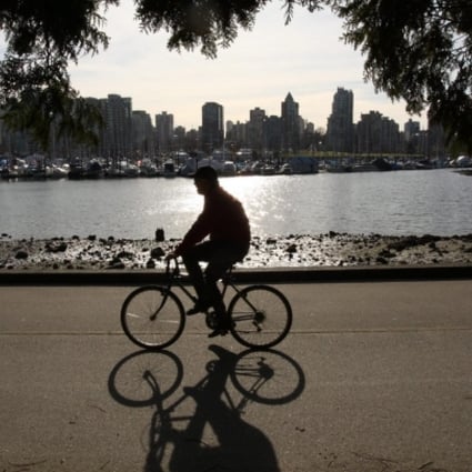 In parts of Vancouver an estimated 23 per cent of flats are empty because the buyers "are so rich they don't even care about the return on their investment". Photo: EPA