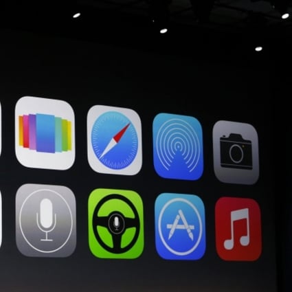 New Apple iOS7 features are displayed on screen during the Apple Worldwide Developers Conference in San Francisco. Photo: Reuters