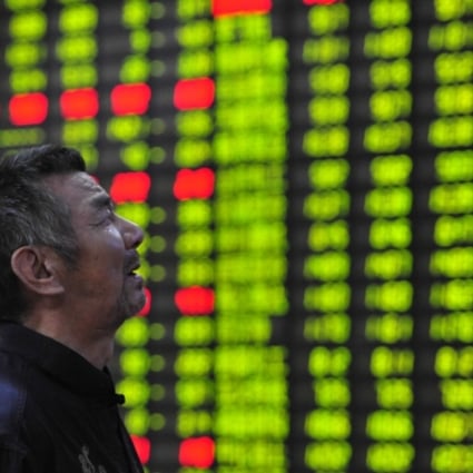 An investor is seen at a trading hall of a securities firm in Jiujiang, east China's Jiangxi Province. Photo: Xinhua