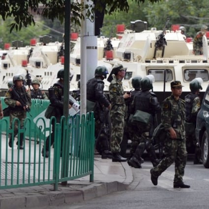Xinjiang beefed up army force after the latest riot. Photo: AFP