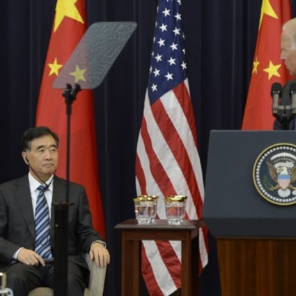 Vice Premier of China Wang Yang (left) listens to US Vice President Joe Biden deliver remarks during China Strategic and Economic Dialogue. Photo: EPA