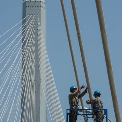 This new bridge will halve the driving time between Shaoxing and Shanghai. It adds to Shanghai's rapid development, with its new free-trade zone being potentially the most transformative. Photo: Xinhua