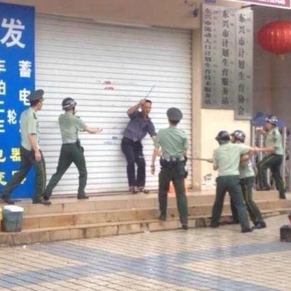 A screen grab of an online video clip that records the attacker's arrest. Photo: SCMP Pictures