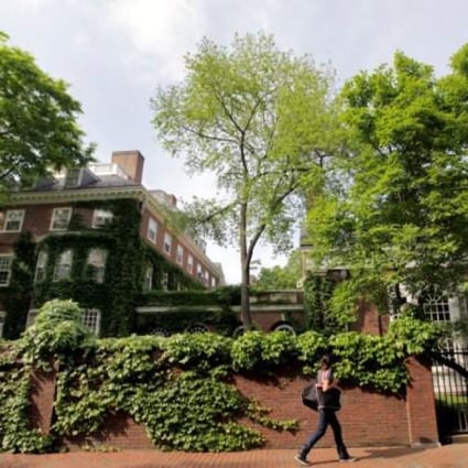 A student walks by buildings on the campus of Harvard University in Cambridge, Massachusetts. America's leading universities still attract many Hong Kong students. Photo: AP 