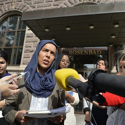 Swedes wear scarves to protest hijab attack South China Morning Post