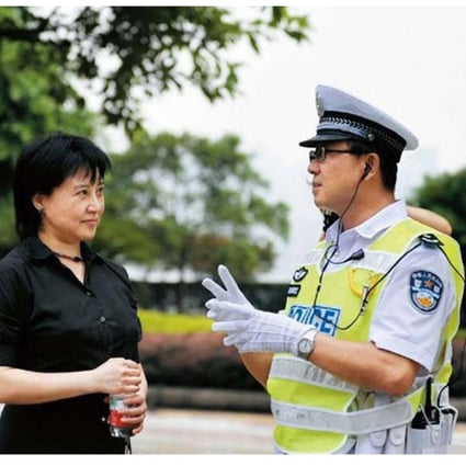 Bo's wife Gu Kailai with his former right-hand man Wang Lijun, in uniform - the pair became very close, according to Bo. Photo: SCMP