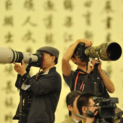 Journalists at work during a press conference after the National People's Congress in 2011. Photo: Xinhua