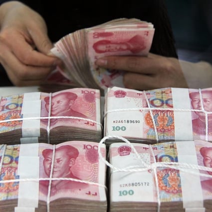 The yuan is expected to make a smaller gain this year. Photo: Xinhua