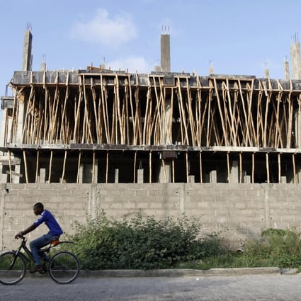 A building under construction in Lagos, Nigeria. 16 million new homes are needed just to meet demand in the country. Photo: Reuters